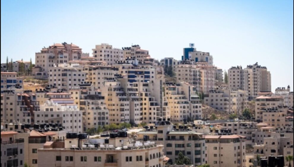 A panoramic view of the city of Jerusalem with its iconic landmarks, including the Dome of the Rock and the Western Wall in the Palestine Cities